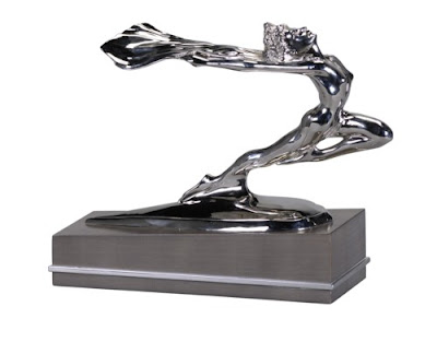 Theodore Alexander makes decorative accessories. These were introduced at the 2009 autumn High Point Furniture Market. Hood ornament as seen in Gift & Home Today