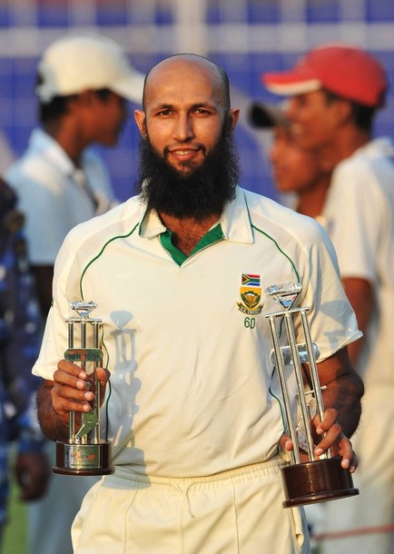 [Hashim+Amla+of+South+Africa+poses+with+the+trophies+for+Man+of+the+Match+and+Man+of+the+Series+during+day+five+of+the+Second+Test+match+between+India+and+South+Africa+at+Eden+Gardens_18022010.jpg]