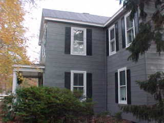 Tin roof color black encorporated into color scheme of VA homestead