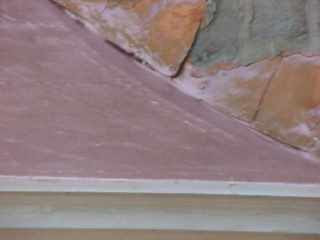 Roofdx copper with true copper flakes applied to roof surface