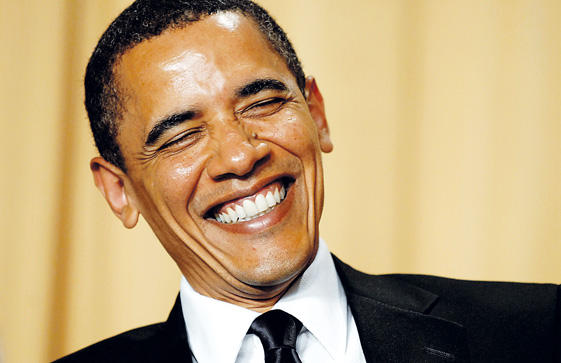 [Barack+Obama+se+ríe+durante+la+actuación+de+la+actriz+Wanda+Sykes+en+la+cena+con+la+prensa..jpg]