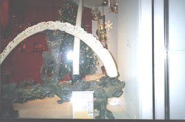 "Wooly Mammoth tusk carving" at a Tsim Tsha Tsui shop.