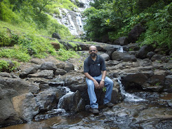 Relaxing at a waterfall stream.