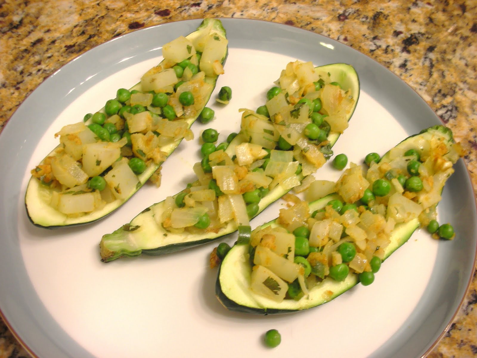 Everyday Vegan Stuffed Zucchini with Potatoes and Peas