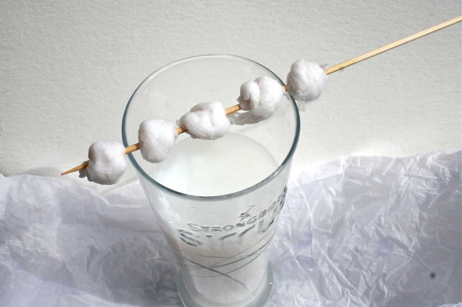 Hilary Bravo Making plain white papiermâché beads ready for decorating.