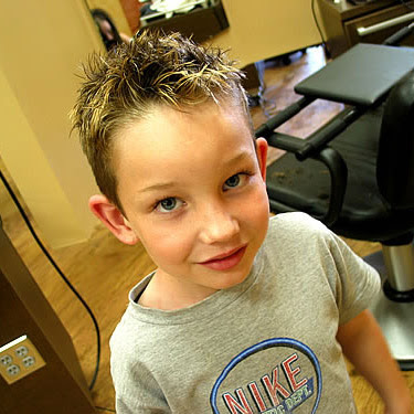 A spiked hairstyle is fashionable but still short so it is 