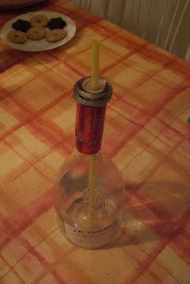 Láhev vína s provrtaným špuntem