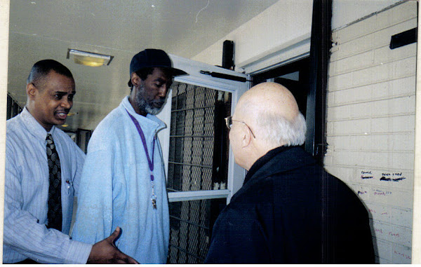 Cardinal George receives a warm welcome from Robert Taylor Residents