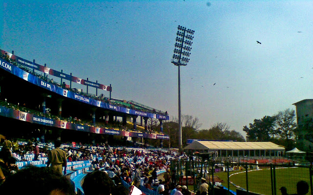 Mobile Clicks of IPL Match between Delhi DareDevils and Chennai Super Kings on 19th March 2010 @ Firoz Shah Kotla, Delhi, INDIA: Posted by VJ on PHOTO JOURNEY @ www.travellingcamera.com : VJ, ripple, Vijay Kumar Sharma, ripple4photography, Frozen Moments, photographs, Photography, ripple (VJ), VJ, Ripple (VJ) Photography, VJ-Photography, Capture Present for Future, Freeze Present for Future, ripple (VJ) Photographs , VJ Photographs, Ripple (VJ) Photography :  I don't follow cricket and but know few players who have big name in the world of Cricket. On Friday we had an office outing to Firoz Shah Kotla to watch IPL Match between Delhi DareDevils and Chennai SuperKings...Cameras were not allowed inside the stadium :(  But I managed with my Nokia Phone :): This Stadium was originally a fortress built by Sultan Ferozshah Tughlaq to house his version of Delhi city called Ferozabad. A pristine polished sandstone pillar from the 3rd century B.C. rises from the palace's crumbling remains, one of many pillars left by the Mauryan emperor Ashoka; it was moved from Punjab and re-erected in its current location in 1356. The Feroz Shah Kotla was established as a cricket ground in 1883. The first test match at this venue was played on November 10, 1948 when India took on the West Indies. Anil Kumble took 10 wickets in an inning on this ground in 1999, only the second time this feat has been achieved in test cricket. It is owned and operated by the DDCA (Delhi District Cricket Association). Since 2008 the stadium has been the home venue of the Delhi DareDevils of the Indian Premier League. On 27th December 2009, an ODI match between India and Sri Lanka called off because pitch conditions were classed as unfit to host a match. The ICC is currently conducting an investigation, and a possible sanction could include the Feroz Shah Kotla being rejected as a venue for the 2011 Cricket World Cup.