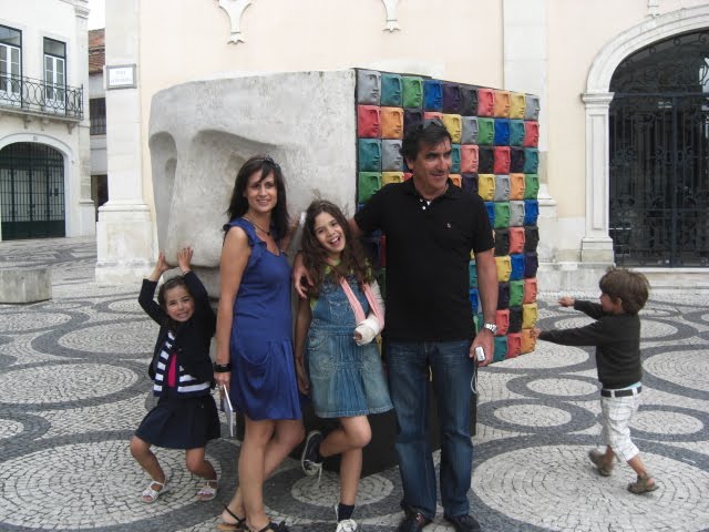 Carla, Urbano and staff near a public sculpture of Queimadela