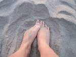 Bare Feet in Warm Sand