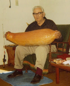 My great-uncle Arlene showing off a Banana Squash he grew sometime in the mid 80's!