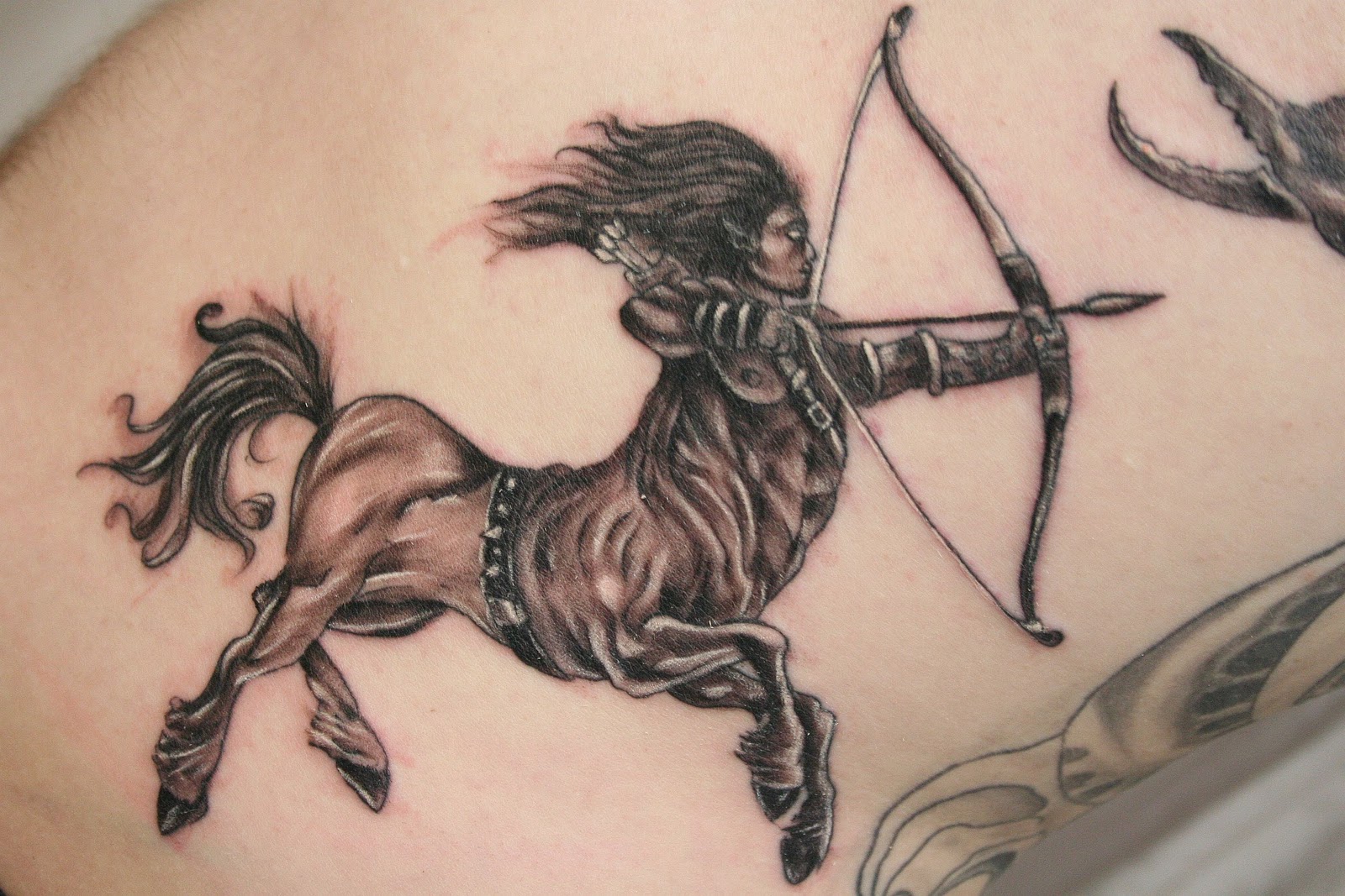 Tattoos With Zodiac Signs