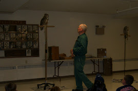 Stan Richardson from Birdsacre at a recent presentation of owls at the Brewer Auditorium.