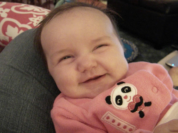 Smiling at 8 weeks old