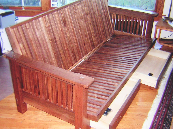 Custom designed and built Craftman's style futon built of walnut milled from client's tree.