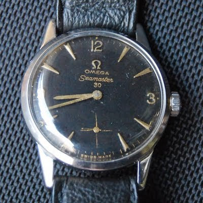 IMAGES OF THE OMEGA WATCH BEFORE REPAIR: