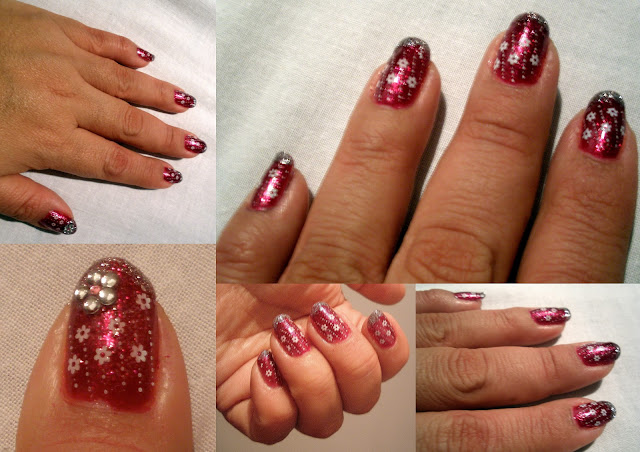 Nails using a Flower and Glitter Design.