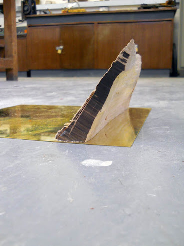 Lumber and brass construction (student work)