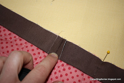 Tutorial on binding a quilt featured by top US quilting blog, Diary of a Quilter