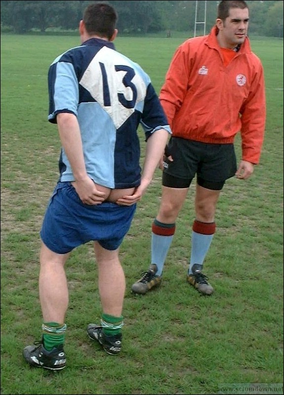 Men in Shorts and Underwear Rugby player showing off
