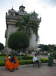 Monks and locals at Patuxai, Vientiane