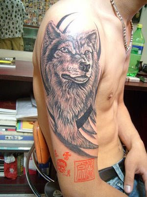 gypsy head tattoo. Wolf arm tattoo.