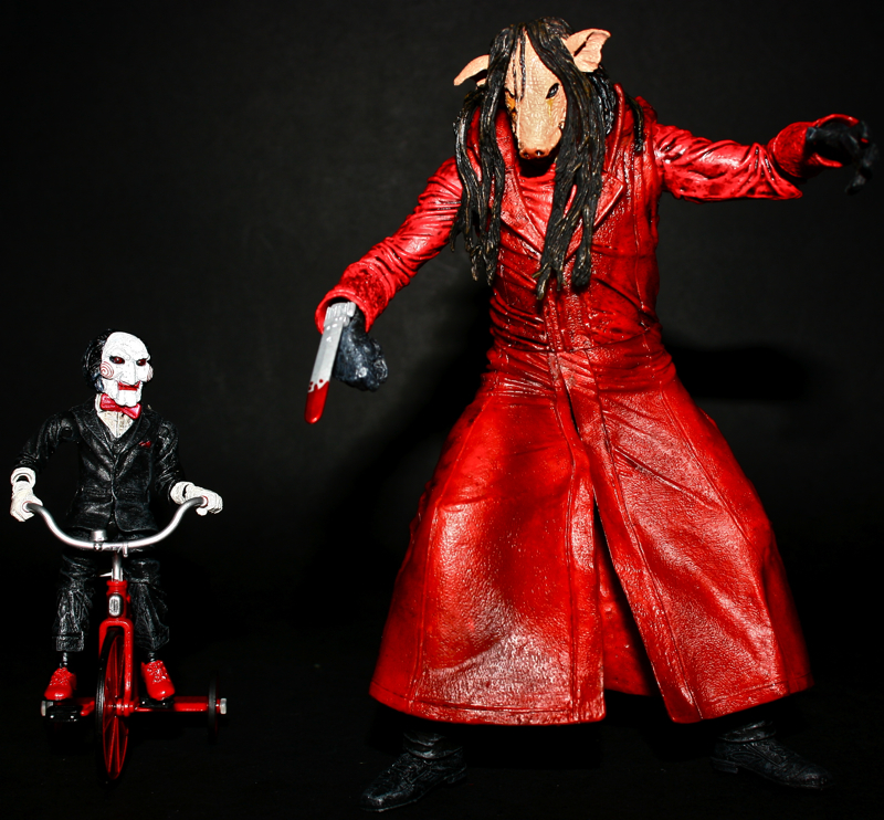 saw-iii-jigsaw-killer-features-puppet-and-tricycle-neca-2006-chemical-toys