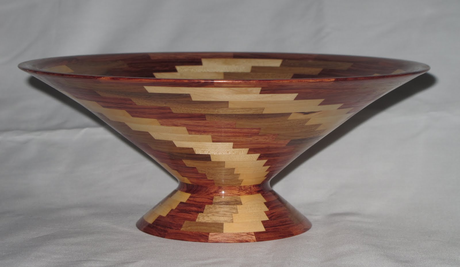 Segmented Wooden Vases & Bowls Segmented Maple, Walnut & Burbinga bowl.