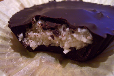 Bite taken out of one High Raw Vegan "Peppermint Patties" showing filling
