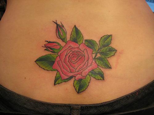 rose tattoos on hip. Large colorful rose cluster on