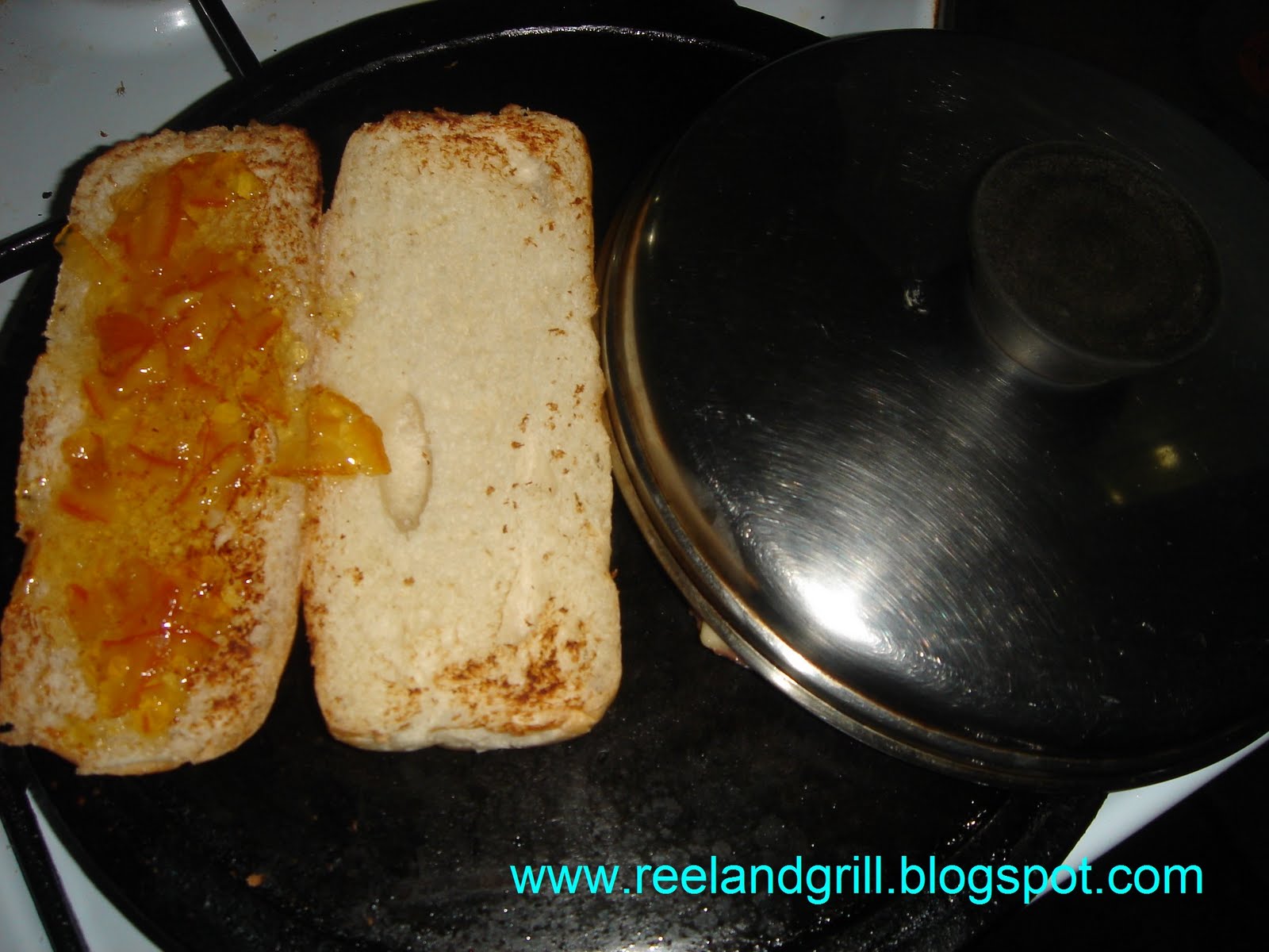 Reel and Grill Sausage Sandwich with Cheese and Orange Marmalade