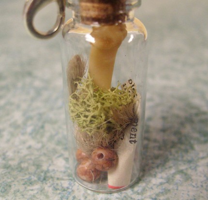 Curious bottle charm by Altered beauty