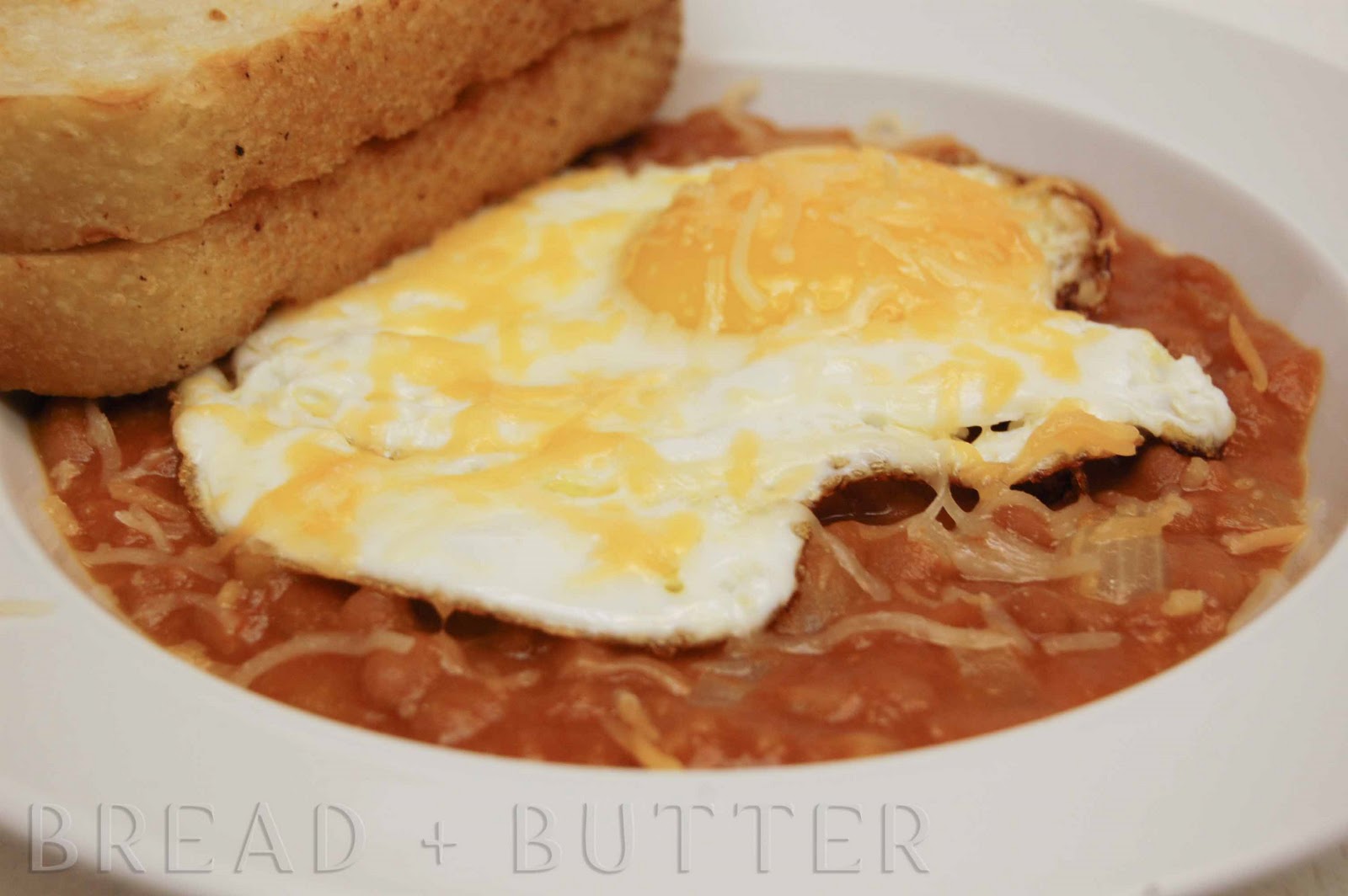 Bread + Butter Pork and Beans with a Fried egg