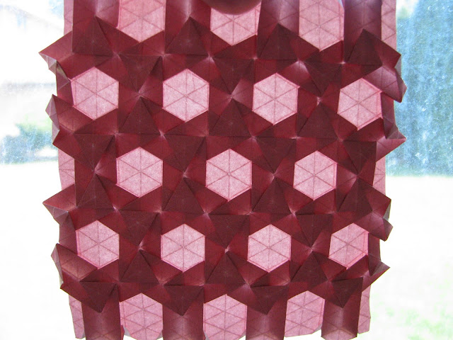 Eric Gjerde Red Double Pleat Hexagon Tessellation window lit front