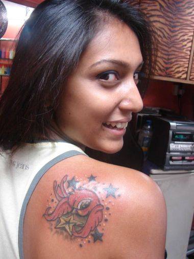 cross tattoos for women on shoulder. Shoulder Tattoos: Bird and Stars Tattoo on Shoulder Women