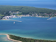We joined the traffic pattern for runway 26 on the island, heeding local . (harbormackinacisland)
