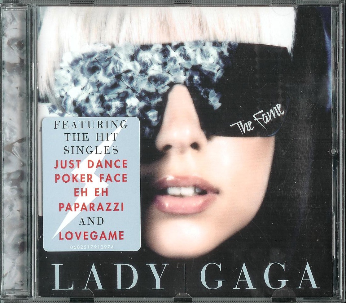 Песня леди гага перевод на русский. Lady Gaga LOVEGAME обложка. Lady Gaga Poker face обложка. Леди Гага Покер фейс альбом. Lady Gaga the Fame album.
