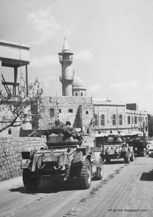 British armor on the way to Haifa port last day of British forces in Israel