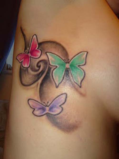 Bright and large butterfly tattoo design can also make your back look very