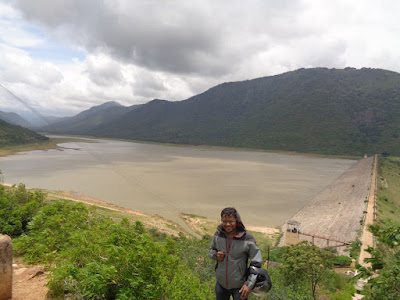 Ashok with the Gundal dam in the background