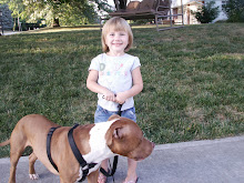 We take Jason's Dog Disel, for a walk everyday! Cora likes to hold the leash by herself.