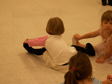 Cora at her dance class~doing stretches!