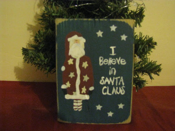 "I Believe in Santa Claus" sill sitter