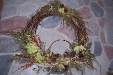 A Christmas wreath made with natures flowers of Winter Berrries and Sweet Annie.
