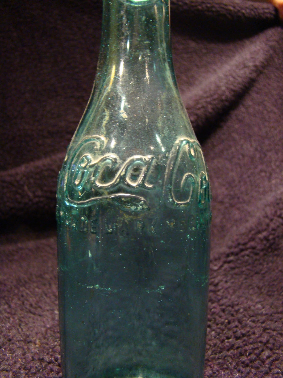 Dust Off The Bottle Early Aqua CocaCol