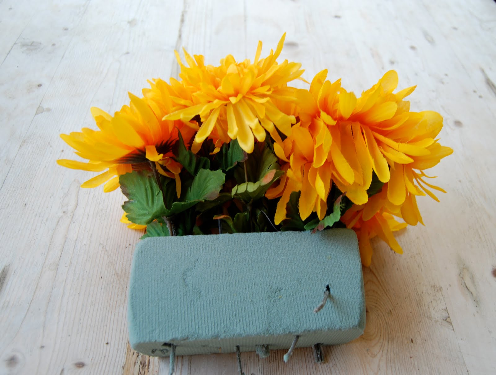 Imparting Grace Arranging silk flowers