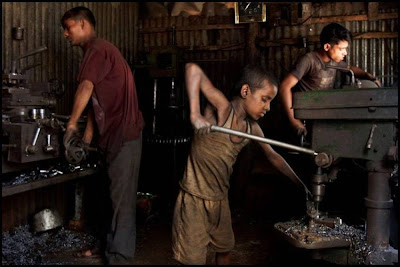 Childern Working On Drill Machine