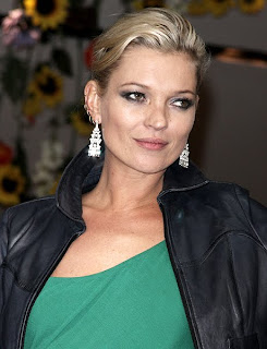 Kate Moss flaunts cleavage to promote her Topshop collection