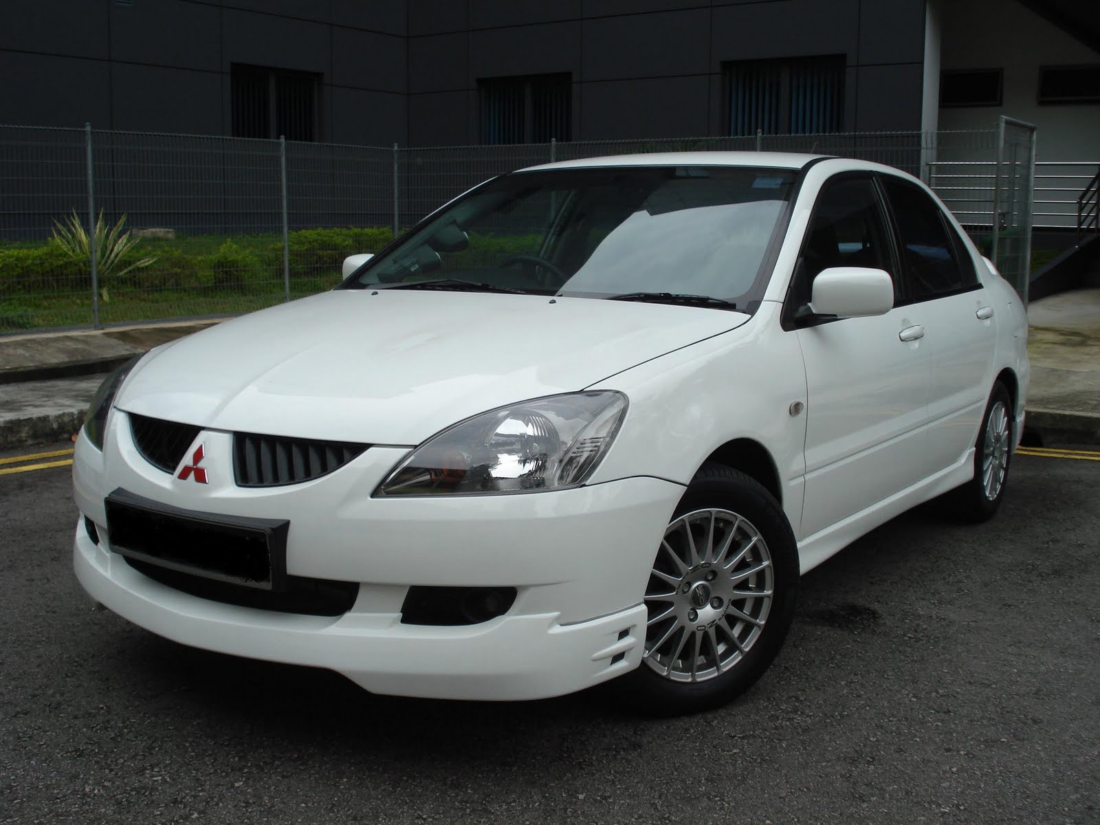 Specialize in Used Cars & Car Insurance Mitsubishi Lancer